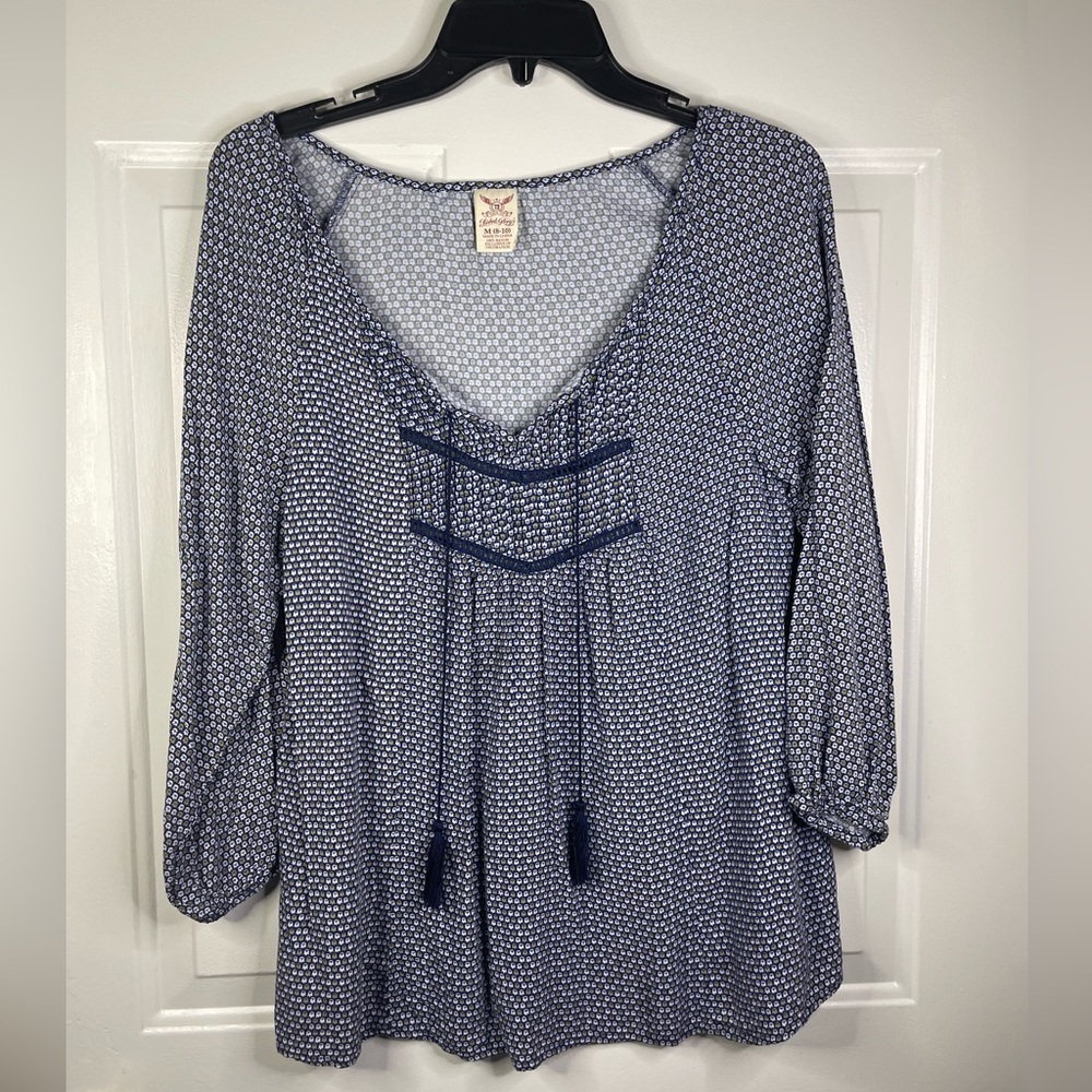 Faded Glory floral V-neck with tassels.